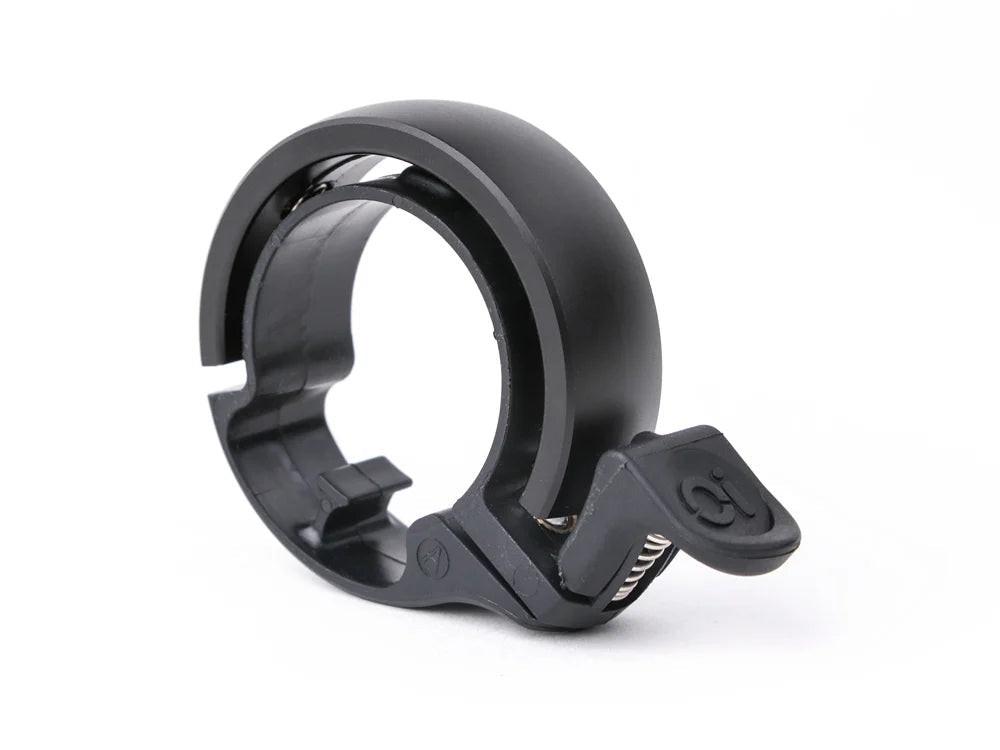 knog Glocke Oi Between 31,8mm black.