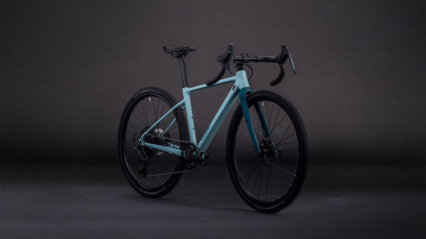 CUBE Nuroad Rookie Pro tealgrey'n'teal, modernes Rennrad im Studio-Produktbild