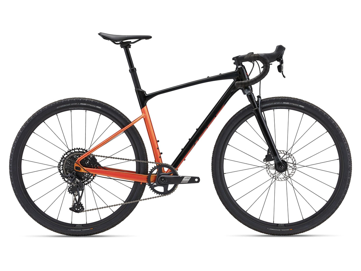 GIANT Revolt X 1 Gravelbike in Panther/Helios Orange, Seitenansicht